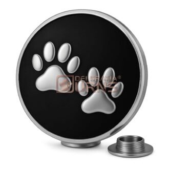 black and silver round pet cremation urn with two raised paw prints and bottom screw closure